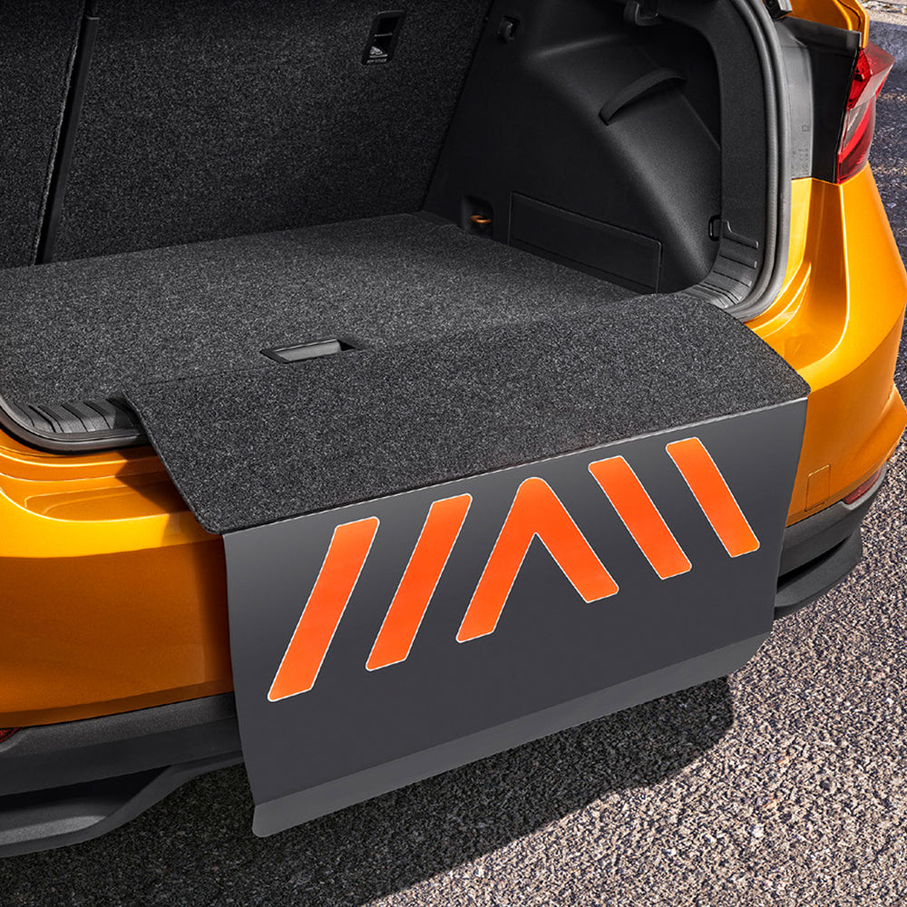Loading edge cover It protects the rear bumper with warning elements